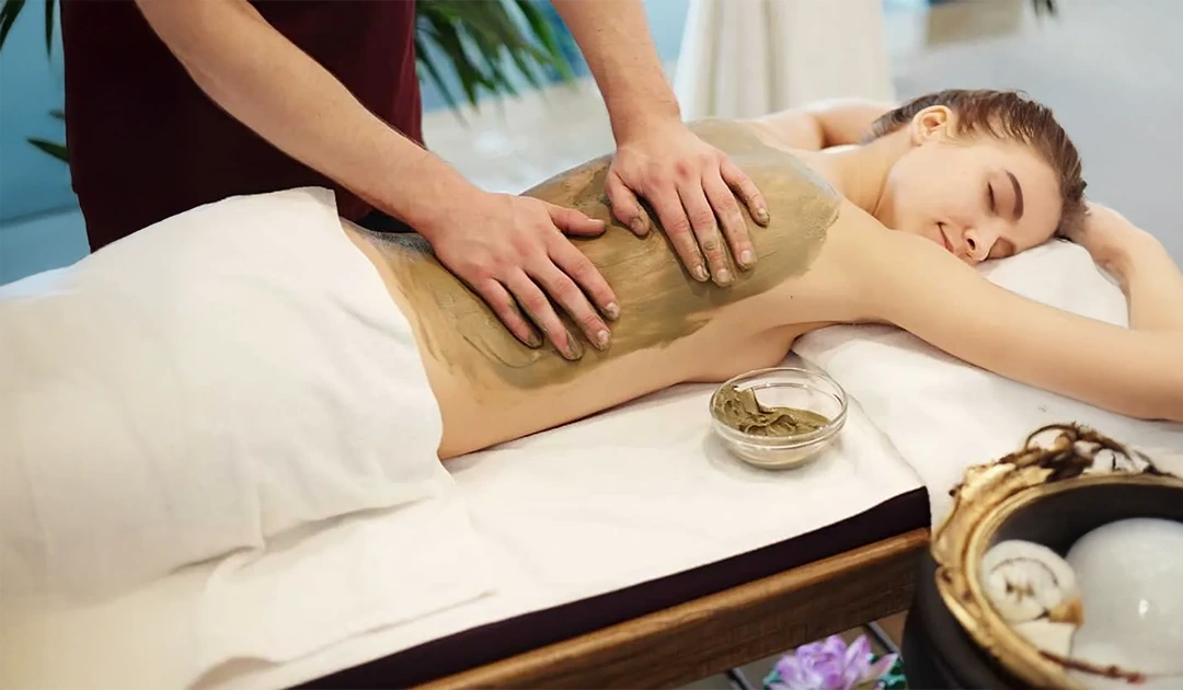 Brazilian detox therapy body wrap application in Dallas